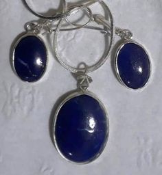 Set of 4 pieces Sterling Silver decorated with Genuine Lapis Lazuli Charm pendant and Earrings. Total weight : 25 Grams Silver Oval Jewelry Sets With Matching Earrings, Saturated Blue, Lapis Lazuli Jewelry, Pendant With Chain, Matching Necklaces, Sterling Silber, Lapis Lazuli, Wearable Art, Charm Pendant