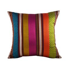 a colorful striped pillow on a white background