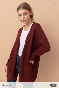 This cozy, soft cardigan is the perfect addition to any wardrobe. The open front design and mossy knit add stylish and functional elements, keeping you warm and comfortable in any weather. Enjoy the luxuriously soft material of this timeless piece. Reversible Clothing, Soft Knit Cardigan, Burgundy Cardigan, Classic Sweater, Cozy Cardigan, Long Style, Maxi Dresses Casual, Maxi Wrap Dress, Open Front Cardigan