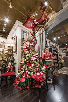 a decorated christmas tree in a store