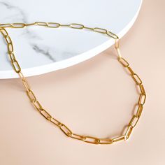 Gold Paperclip Chain Necklace Chic Tarnish-resistant Link Paperclip Bracelet, Modern Paperclip Chain Jewelry, Chic Paperclip Bracelet With Adjustable Oval Link, Minimalist Chunky Paperclip Chain Jewelry, Modern Everyday Paperclip Bracelet With Delicate Chain, Modern Paperclip Bracelet With Delicate Chain For Everyday, Minimalist Jewelry With Chunky Paperclip Chain, Modern Paperclip Bracelet With Tarnish Resistant Rectangular Links, Modern Tarnish-resistant Paperclip Bracelet