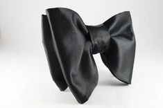 "Oversized Bow tie, Large bow tie Black bow tie for wedding Tom Ford style New Way Creation Design pre tied and adjustable handmade bowtie Black Bow tie for wedding, Pre-tied black bow tie used on tuxedo for wedding. Velvet option available. All items are handmade, sewn not glued, and you will have a high quality item. Dimension: Adult 1: 4.75 / 3.95\" (12 / 10 cm) Adult 2: 4.75 / 3.15\" (12 / 8 cm). Child size: 3.90/2.5\" (10/6 cm) Adjustable strap up to 21\" for adult Our recommendation care: Tuxedo For Wedding, Tom Ford Style, Wedding Toms, Wedding Velvet, Groom Bowtie, Velvet Bow Tie, Black Bow Tie, Bow Tie Wedding, Tuxedo Wedding