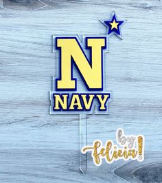 a wooden sign that says n navy and is next to a sticker with the word filipin on it