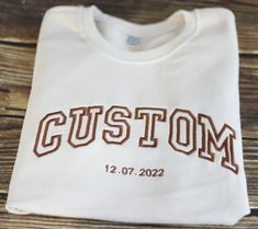 It's the perfect gift for him/her! Our embroidery skills are superb, so you can buy with confidence! Customize your own exclusive embroidered sweatshirt. For the sake of beauty so we only support the customization of capital letters. If you feel that the font does not meet your needs, you can contact me via chat or even submit your design and I will communicate with you and find a way to complete your idea. For those who have trouble choosing, we offer a small (but common) selection of embroider Varsity Hoodie With Letter Embroidery For College, Collegiate Letter Embroidery Sweatshirt For College, Varsity Sweatshirt With Letter Embroidery For College, Varsity Crew Sweatshirt With Embroidered Text, White Hoodie With Embroidered Text For College, Varsity Sweatshirt With Embroidered Text For Streetwear, College Style Sweatshirt With Letter Embroidery, Varsity Sweatshirt With Custom Embroidery For Fall, Collegiate Custom Embroidered Sweatshirt For College