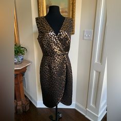 Wedding Season Is Upon Us! This Dress Is A Showstopper. Very Flattering With A Beautiful Neckline. Shows Just The Right Amount. Brand: Samuel Dong Size: Large Fabric: 80% Polyester, 20% Lurex (Dry Clean Only) Color: Black With Metallic Gold Details. Print Can Be Considered Leopard. This Dress Is An Even Better Version Than The Carolina Herrera Metallic Leopard Dress! Note: Dress Pictured On Live Model Is Not The Dress For Sale. Dress For Sale Has Tags On From Samuel Dong Distributor And Has Neve Formal Brown Dress With Fitted Bodice, Front Zipper Dress, Zip Front Dress, Belted Wrap Dress, Bubble Coat, Asymmetrical Midi Dress, Live Model, Event Dress, Better Version