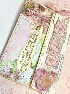 an altered book with flowers on it