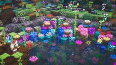 an aerial view of a garden with lots of flowers and plants in the middle of it