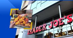 a trader joe's sign on the side of a building with windows in front of it