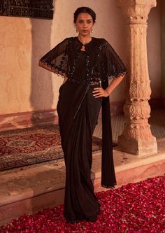 Nidhika Shekhar-Black Embroidered Sari And Cape Set-INDIASPOPUP.COM Stylish Outfits For Wedding Guests, Cape Style Blouse For Saree, Saree Cape Blouse, Drape Saree With Cape, Saree With Cape Blouse, Saree With Cape Style, Black Western Blouse, Black Saree With Jacket, Different Types Of Wearing Saree