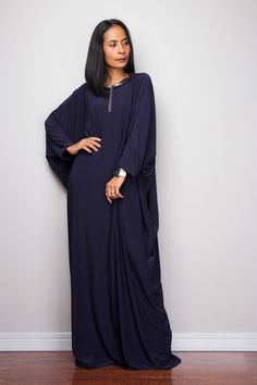 "Navy Blue Kaftan Dress, Maxi Dress, Long boho dress, Loose fit dress, Modest dress, Dark Blue kaftan with pockets PRODUCT SIZE : One Size Fits Most * Chest : free up to 58\" * Waist : free up to 58\" * Hips : free up to 58\" * Circumference bottom hem : 45\" * Length : 56\" * Sleeve length : 23\" MATERIAL * Spandex Venetia * Zipper on the back MODEL : * Model chest : 32\", Height 160 cm (5.2) without high heel * Accessories excluded Produced by NUICHAN IMPORTANT NOTE *Please note that colours s Blue Kaftan Dress, Long Boho Dress, Blue Kaftan, Dress Loose Fit, Loose Fit Dress, Kaftan Top, Dress Dark Blue, Boho Dresses Long, Dress Modest