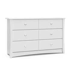 a white dresser with six drawers on top