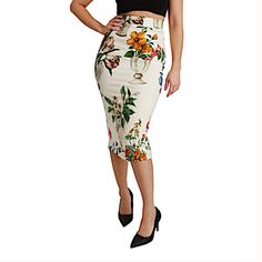 Dolce & Gabbana Multicolor Silk Stretch Flower Vase Skirt Gorgeous Brand New With Tags, 100% Authentic Dolce & Gabbana Skirt. Model: Midi Length, High Waist Color: White With Multicolor Floral Print Zipper Closure Silk Stretch Inner Lining Logo Details Made In Italy Material: 94% Silk 6% Elastane Lining: 96% Silk, 4% Elastane White Floral Print Party Bottoms, Chic White Skirt With Floral Print, Feminine Multicolor Floral Print Bottoms, Multicolor Floral Print Feminine Bottoms, Elegant Multicolor Floral Print Bottoms, Elegant Long Skirt With Floral Print, Fitted White Skirt With Floral Print, Elegant Multicolor Fitted Bottoms, Elegant Fitted Multicolor Bottoms