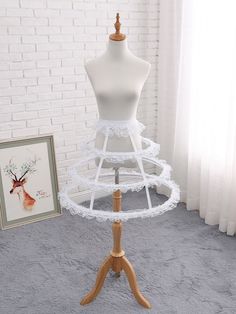 Features: It features elastic waist, lace trimmed hem, hollow birdcage petticoat.Waist: 60-90cm.Maximum Diameter: 60cm.Petticoat Length: 47cm.Attention: This price includes a petticoat only, others are not included. Lace Petticoat With Attached Cancan, Tiered Skirt, Lace Tiered Petticoat With Attached Cancan, Lace Petticoat With Lace Trim And Tiered Skirt, Fitted Lace Petticoat With Lace Trim, Spring Lace Petticoat With Lace Trim, Cage Skirt, Lace Costume, Blue Ball Gowns, Hoop Skirt