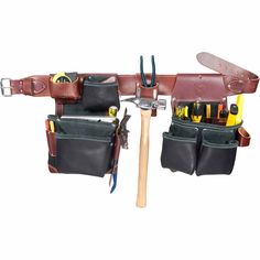 a tool belt with tools hanging from it's side and two leather pouches holding tools