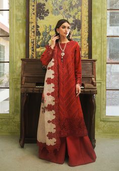 Brand: ZarqashProduct Code: ZQT 007 ROSALINECollection: Zarqash Tresor Unstitched Luxury Lawn CollectionFabric: Lawn DESCRIPTION Introducing “Rosaline,” presented in a scarlet red hue that radiates serenity and elegance. Delicate embroideries, rendered in silk threads of rogue scarlet and maroon adorn the fabric with intricate motifs inspired by the beauty of nature. The shirt’s borders exhibit meticulous craftsmanship, while the contrasting digital print dupatta features embroidered details reminiscent of swirling garden blossoms. “Rosaline” offers wearers the opportunity to embody elegance and sophistication in every step, making it a perfect choice for those seeking understated yet refined sartorial expressions. DESIGN DETAILS: Schiffli Embroidered Center panel (Right) Schiffli Embroide Luxury Wear, Fabric Stores Online, Jacquard Fabric, Silk Thread, Cut Work, Designer Suits, Formal Wear, Panel Siding, Bridal Wear