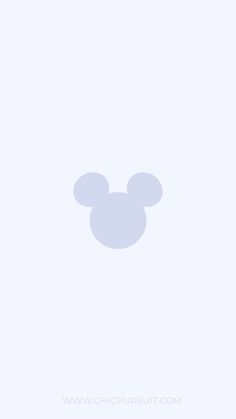 the mickey mouse logo is shown on a light blue background with white circles around it