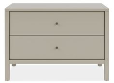 a white nightstand with two drawers on each side and an open drawer in the middle