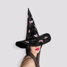 Embrace the enchantment of the season with exquisite velvet witch hat. This witch hat is the perfect accessory to complete your witch costume, adding an air of mystery and magic to your look. Crafted from luxurious velvet, this witch hat women with butterfly is both elegant and comfortable to wear. Whether you're attending a Halloween party or casting spells in style, this wizard hat is sure to turn heads. Youre Halloween costume will be great with this wide brim witch hat. The classic design of this Halloween hat makes it a versatile accessory for any Halloween witch, sorcerer, or wizard outfit. This mage hat looks good and cool. Elevate your Halloween attire with enchanting black witch hat to wear and step into a world of fantasy and fun. This warlock hat will be your favourite accessory Halloween Costume Hat Accessories, Black Witchy Hat For Halloween, Fitted Witchy Hat For Halloween, Witchy Black Brimmed Costume Hat, Black Witchy Brimmed Costume Hat, Black Brimmed Witchy Costume Hat, Halloween Fitted Wide Brim Costume Hat, Fitted Wide Brim Halloween Costume Hat, Halloween Wide Brim Fitted Mini Hat