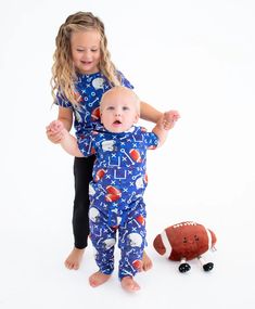 This adorable set is crafted from incredibly soft and breathable viscose from bamboo, cotton, and spandex for an irresistibly comfortable fit! The set features an adorable design perfect for those days spent rooting for your favorite team [toddler girl outfits jumpsuits and rompers, cute toddler girl outfits, toddler boy outfits, toddler boy rompers, football sweatsuit, football pajamas, jumpsuits and rompers, #sweaters #bamboo #toddlerfashion] Shop Birdie Bean Baby today! Cute Toddler Girl Outfits, Toddler Boy Romper, Cute Toddler Girl, Hoodie Set, Boys Romper, Boys Pajamas