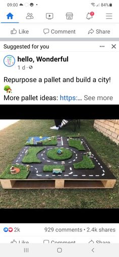 an image of a table made out of wood and fake grass with cars on it