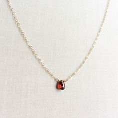 This real garnet necklace is small and simple. It's a great gift idea for people who are born in January. Garnet Choker, Danty Necklace, Garnet Necklace Gold, Delicate Diamond Necklace, Ballroom Jewelry, January Birthstone Necklace, Jewelry Design Studio, Black Hills Gold Jewelry, Pretty Accessories