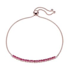 Embrace elegance with Aurealis' lab created ruby bolo bracelet in 10k rose gold. This stunning bracelet features a vibrant lab-created ruby, known for its rich red hue and exceptional clarity. The adjustable round wheat chain extends up to 9", ensuring a perfect fit for any wrist size, while the bolo design adds a modern and sophisticated touch. Ideal for both casual and formal occasions, this bracelet's exquisite craftsmanship and unique design make it a luxurious addition to any jewelry collection and a thoughtful gift option. | PAJ Lab Created Ruby Bolo Bracelet in 10k Rose Gold, Adjustable Round Wheat Chain up to 9" Adjustable Elegant Ruby Bracelet, Formal Pink Jewelry With Adjustable Chain, Elegant Pink Jewelry With Lab-created Ruby, Elegant Pink Lab-created Ruby Jewelry, Adjustable Pink Gold Bracelet For Formal Occasions, Adjustable Pink Gold Bracelets For Formal Occasions, Rose Gold Lab-created Ruby Fine Jewelry, Bolo Bracelet, Formal Occasion