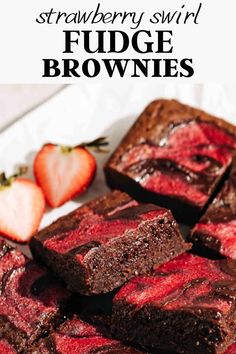 strawberry swirl fudge brownies on a plate with strawberries