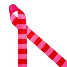 a pink and red striped ribbon on a white background