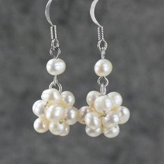 The ball drop earrings are handmade using fresh water pearls. Free US shipping. Customers who purchased this item said: -Beautiful earrings for a Christmas gift, and a very unexpected (and beautiful) gift pair to boot! Absolutely perfect, exactly as expected (if not better!) -Love these! They go Handmade Delicate Pearl Earrings, Handmade Dainty Pearl Earrings, Dangle Pearl Earrings For Bridesmaid Gift, Pearl Dangle Earrings For Bridesmaid Gift, Elegant Dangle Pearl Earrings For Mother's Day, Dainty Handmade Pearl Earrings, Handmade Delicate Drop Pearl Earrings, Delicate Handmade Drop Pearl Earrings, Handmade Pearl White Drop Earrings