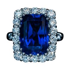 An 11.51 ct old mine cut Ceylon sapphire of a vivid blue color is set in a modern platinum and diamond ring. The diamonds are bright white and clean: F-G color, VS clarity. Total diamond weight is 1.61 ct. The sapphire and diamond cluster measures 19 x 15 mm (11/16 x 9/16 in.) Ring size 7 (17 mm) sizable Weight is 14.55 grams. The ring is accompanied by the AGL Prestige Gemstone Report 1113777 for the sapphire. Round Diamond Setting, Platinum Diamond Rings, Ceylon Sapphire, Jewels Rings, Golden Ring, Minerals And Gemstones, Blue Gems, Platinum Ring, Sapphire Jewelry