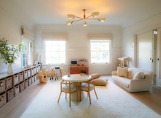 the living room is clean and ready to be used for children's play time