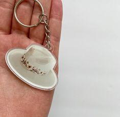 This acrylic keychain is a great addition to your keys, bag, or backpack! This keychain is approximately 2"x1.5" White Keychain With Key Clip Gift, White Keychain With Key Clip For Gift, Acrylic Guitar Keychain, Floral Hat, Photographer Gifts, Backpacks, Hats, Photographer, Floral