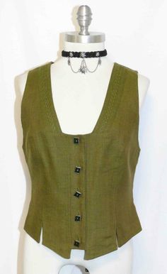 *************************************  AUTHENTIC WOMEN'S ~ TRACHTEN ~ VEST **************************************   Made By ***  MEICO  ***     * Color *  In A Soft Linen Green ?? Embroidery In A Little Darker Loden Green * Material * 70 % LEINEN 30 % VISCOSE LEINEN Means " LINEN " In German FUTTER / LINING 100 % POLYESTER The Vest Is " COMPLETELY LINED " On The Inside No Pockets Buttons 6 - Total Very Pretty Buttons 5 Buttons In The Front 1 Button On The Inside For If One Gets Lost ************ Fitted Green Vest With Button Closure, Fitted Green Vest For Fall, Sleeveless Vest Pattern, Sweeney Todd Costume, Vest Pattern Free, Loden Green, Green Embroidery, Green Vest, Vest Pattern