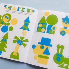 an open children's book with different shapes and sizes