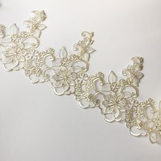 1 Yard  Gold Lace Trim Width approx. 21-23cm widest point Luxury sophisticated lace trim ideal for wedding dress, bridal veil, doll's dress,  hair accessories making. Width: See variations Please note that the beads are plastic so the lace trim will feel plasticky which is not a quality issue. If you order more than 3 yards, you might not receive one continuous length.  If this is your concern, please let us know before ordering. For orders of 2 yards or more we will do our best to give a single Elegant Gold Wedding Dress For Ceremony, Beige Wedding Lace With Lace Trim, Cream Lace Wedding Veil, Gold Lace Trim For Wedding, Gold Lace With Lace Trim For Wedding, Wedding Dress With Veil, Lace Bridal Gown, Gold Lace, Beaded Applique