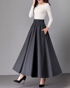 * A high-end long wool skirt, with wide elastic waist, very cool. * Made of wool blends, fully lined and with two side pockets. * Can custom make waist size and skirt length. * Material: Outer-50% wool, 50% polyester; lining-100% polyester * Washing instructions: Dry Clean Only * Size: True to US size, US 0-US 20 are available, you can let us know your usual size and height in your order. * Shipping: Free shipping Processing time : 5-7 Business days Delivery time : 7-20 Business days Tracking nu Gray Long Skirt For Winter, Gray Maxi Skirt For Winter, Elegant Wool Full Maxi Skirt, Gray Flared Maxi Skirt With Lined Skirt, Gray Full Skirt For Winter, Gray Flared Maxi Skirt With Lining, Winter Solid A-line Maxi Skirt, Winter Solid Color A-line Maxi Skirt, Dark Grey Skirt