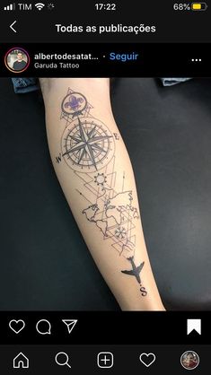 a person with a compass tattoo on their arm