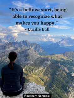 a woman sitting on top of a mountain with a quote about being able to recognize what makes you happy