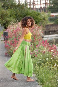 Cool, breezy upcycled sari skirt. Made of beautiful light fabric that's great for summertime lounging. It flows and floats as you walk, a very elegant and feminine skirt.  SIZE  ONE SIZE:  Trousers waistband = 28-36" (71-91.5 cm) Trousers length = 36" (91.5 cm) THIS LISTING IS FOR BRIGHT GREEN Also available in other colours, please check our listings. Code: DRAGONFLY SKIRT (SDDFLY) Bollywood Style Long Skirt For Summer, Bohemian Long Skirt For Navratri, Green Lined Skirt Bottoms For Festival, Green Lined Skirt For Festival, Green Hippie Maxi Skirt For Festival, Green Bohemian Maxi Skirt For Festival, Summer Festival Harem Skirt, Bohemian Green Maxi Skirt For Festivals, Green Bohemian Gathered Skirt