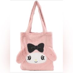 Sanrio’s Soft My Melody Fuzzy Feelings Tote Bag Is Functional And Stylish. With Black Bow, Signature Floppy Ears And Embroidered Heart Eyes. Show Your Plush Love While On The Move. Length : 15 Inches Width : 13 Inches One Large Opening With A Magnetic Closure Inside Open Pocket 100% Polyester Limited Edition Free Gift With Purchase! Sanrio Bag, Digital Wardrobe, Dream Items, Scene Punk, Jirai Kei, Sanrio My Melody, Multipurpose Bag, Floppy Ears, Boss Baby