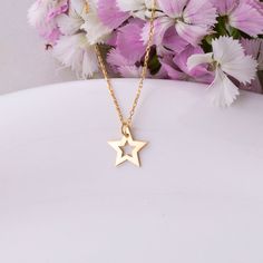 PLEASE READ DESCRIPTION & POLICIES Star Pendant Necklace / Cute Star Necklace / Dainty Star Necklace / Small Star Necklace / Delicate Star Necklace / Gold Star Necklace  DESCRITION  Shine bright with this dainty star pendant necklace, crafted from nickel-free 925 Sterling Silver. Available in gold-plated, rose gold-plated, and sterling silver finishes, each piece features a premium 1-micron layer of real 18ct gold for a highly polished look. This cute and delicate star necklace, available in lengths from 14" to 20", includes a 1mm rope chain secured with a spring ring closure. Perfect for adding a touch of sparkle to any outfit, this small star necklace makes an elegant and charming gift for her.   DETAILS  ✦ Material: 925 Sterling Silver (nickel free)(stamped) ✦ Finish: Gold, Rose Gold, S Star-shaped Charm Necklace For Gift, Star Charm Necklace As Gift, Star Charm Necklace For Gift, Star Charm Necklace Gift, Gold Necklaces With Star Charm For Birthday, Gold Star Necklace, Star Necklace Gold, Cute Star, Necklace Cute