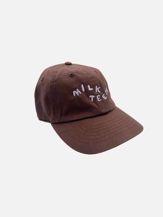 A kid-sized baseball cap with Milk Teeth logo embroidery. In soft cotton canvas, these hats have all the details of an adult baseball cap, scaled down to fit toddlers and kids. Adjustable brass fastening in back. One size fits approx. 3-9 years. Adult version also available :)