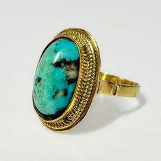 Victorian c1800s - 1920s This is very fine antique 18k late Victorian ring, handcrafted, featuring a vibrant blue 5ct Turquoise cabochon.  Very attractive setting, low profile...great piece. 5.2g 18k solid yellow gold Hallmarked Natural Turquoise cabochon 5 ct S 7 US resizable Excellent antique condition Vintage Yellow Gold Oval Turquoise Ring, Vintage Yellow Gold Turquoise Oval Ring, Antique Oval Turquoise Ring Hallmarked, Vintage Yellow Gold Turquoise Cabochon Ring, Antique Yellow Gold Turquoise Cabochon Ring, Antique Turquoise Ring In Yellow Gold, Antique Oval Turquoise Ring, Antique Turquoise Gemstone Ring For Formal Occasions, Heirloom Yellow Gold Turquoise Cabochon Ring