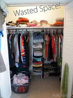 the closet is full of clothes and other things to put in it's bins