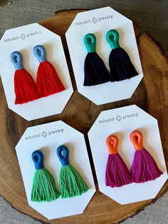 These handmade earrings are the perfect pop of color to compliment any outfit!  the colorful tassels are classic and unique. The handcrafted tassel is constructed from lightweight cotton with a stainless steel ear post.  They measure 3/4" wide by 2 1/2" long.  These unique earrings are perfect for anyone loves accessorizing with on trend, modern or minimalist jewelry. Made from high quality gold plated brass. All jewelry is lovingly made in Massachusetts and ships profesionally packaged in an at Colorful Tassel Earrings As A Gift, Tassel Earrings As A Gift, Colorful Tassel Earrings For Gift, Trendy Tassel Drop Earrings, Chic Handmade Tassel Drop Earrings, Elegant Multicolor Latkans Tassel Earrings, Colorful Tassels, String Earrings, Earrings Classic