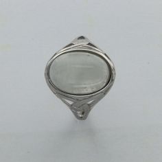 These is a beautiful pair of Sterling Silver R ing with a Rainbow Moonstone Gemstone. The ring are made out of solid 925 Silver and there is no nickel or other substances causing most allergies. This makes the ring hypo allergenic. Size of the Moonstone 1.4 x 1.1 cm or 0.55 x 0.43 inch You will receive the item in a gift box - perfect to surprise someone or yourself. Usually we ship on the same day we receive the payment for the order. We want you to be happy with your purchase. If you do not li Silver Oval Cabochon Jewelry With Bezel Setting, Classic Moonstone Cabochon Ring For Anniversary, Silver Spiritual Rings For Formal Occasions, Formal White Gold Cabochon Moonstone Ring, Polished Moonstone Round Rings, Polished White Moonstone Ring In Sterling Silver, White Polished Moonstone Ring In Sterling Silver, Polished Moonstone Ring, Classic Polished Moonstone Ring Gift