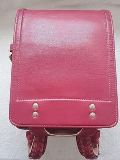 Randoseru : This randoseru made by Mitsukoshi Bag company Which is one of the best randoseru maker in Japan. Its made by high quality Cowhide.  Item: Cowhide Leather school Bag / Japanese Randoseru No. rnd022 Color: Pink Condition: Used/ Very Good. Please check the listing pictures. Size: Adult Wearable You could put your laptop without any ploblem. Mitsukoshi Bag Company / Made in Japan Tsuchiya bag is one of the best randoseru maker in Japan. https://fujiyamarock.etsy.com Shipping Japan Post t Rectangular School Satchel With Luggage Sleeve, Pink Rectangular Laptop Bag For School, Leather School Backpack With Luggage Sleeve, School Laptop Bag Backpack With Luggage Sleeve, Rectangular Laptop Bag For Students, Pink Backpack Satchel For Travel, School Laptop Bag With Luggage Sleeve, Pink Satchel Backpack For Travel, Functional Rectangular Leather Backpack With Removable Pouch