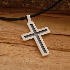 "This handmade oxidized sterling silver cross pendant features a unisex design that is modern, yet elegant, combining just the right amount of style and grace. It is an ideal jewelry option for either a man or woman. Suspended from a sterling silver chain or a black leather cord 48cm long with silver clasp and endings, it is the perfect way to share your message of faith with those around you. It also makes a modern fashion statement that makes an exceptional gift for anyone on your gift list. Y Oxidized Sterling Silver Cross Pendant Necklace, Sterling Silver Oxidized Crucifix Necklace, Oxidized Cross Pendant Necklace, Sterling Silver Oxidized Cross Necklace, Gift Oxidized Cross Pendant Necklace, Oxidized Cross Pendant Necklace For Gift, Oxidized Finish Cross Necklace For Gifts, Oxidized Finish Cross Necklace As Gift, Oxidized Cross Necklace As Gift