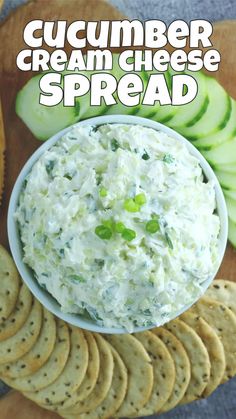 cucumber cream cheese spread in a bowl surrounded by crackers