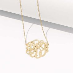 Our Monogrammed Signature Necklaces are available in Sterling Silver or Sterling Silver with Gold Plating! Hand crafted, these monogrammed necklaces are also hand drawn making them truly one of a kind! You are able to select both your chain length preference and monogrammed pendant size. Pricing varies depending on your choice of metal and size! Most people go with the 18 inch chain, but some people that like to wear their necklace longer or over turtlenecks prefer the 20 inch chain length. If y Gold Monogram Necklace, Elegant Initials Name Necklace, Elegant Monogram Jewelry As Gift For Mom, Monogram Initial Pendant Necklace For Mom, Monogram Name Necklace As A Gift, Personalized Stainless Steel Necklace With Initials, Monogram Stainless Steel Jewelry As Gift, Monogram Necklace For Mother's Day, Mother's Day Monogram Round Necklace